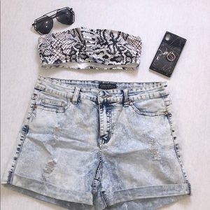 Acid wash high waisted jean shorts.